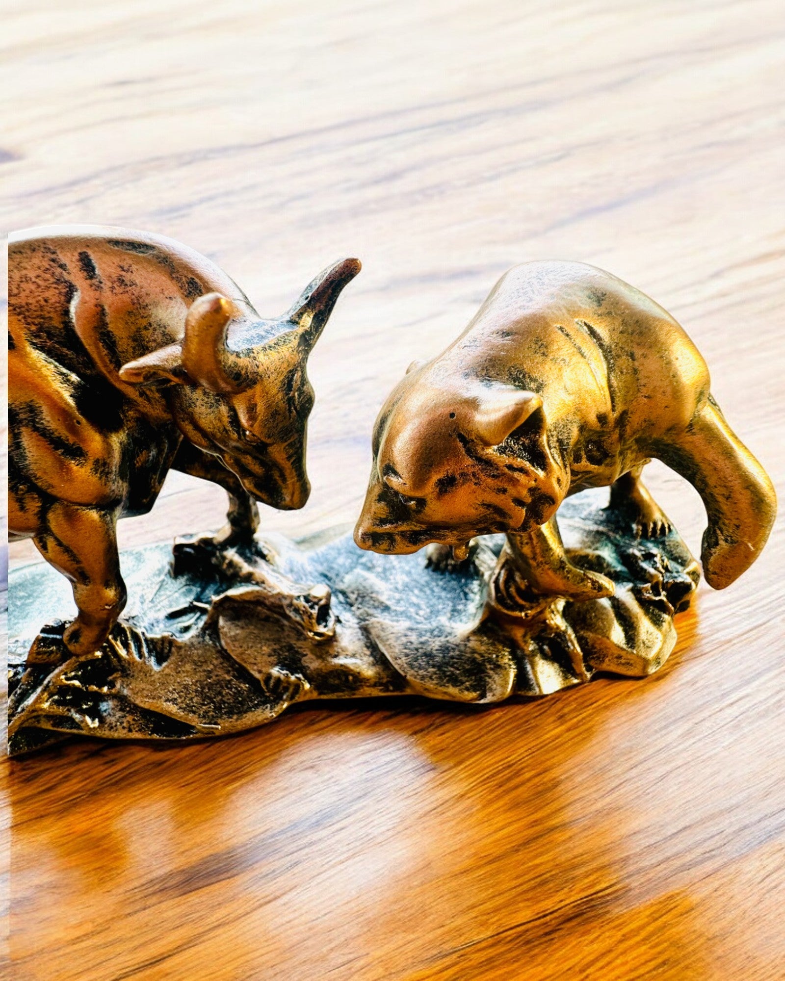 "The Clash of the Bull and the Bear" - Copper-red sculpture with engraving option