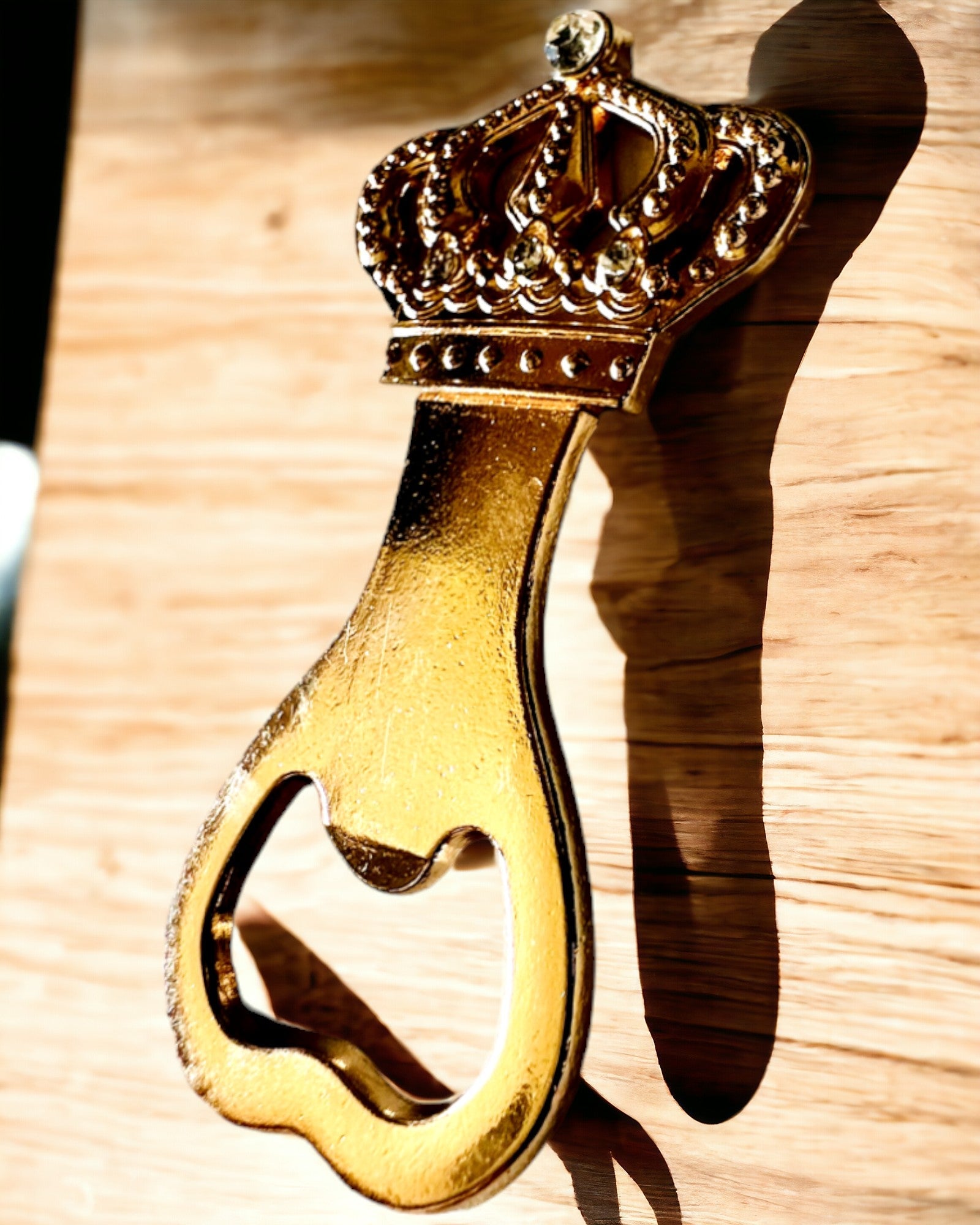 Bottle opener "King's Crown" in gold color, personalization option with engraving.